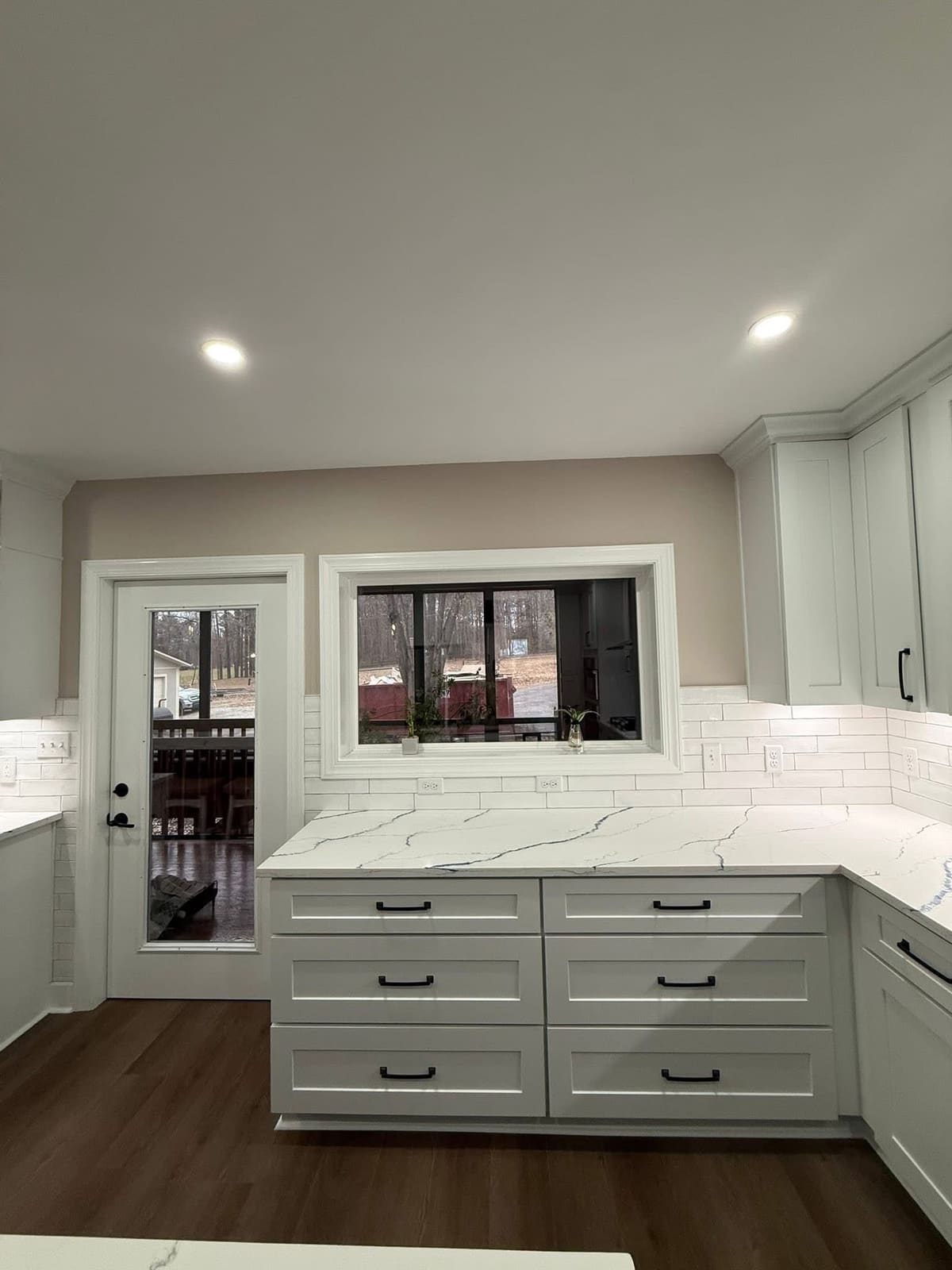 Custom built-in buffet with glass display uppers and lower drawer storage